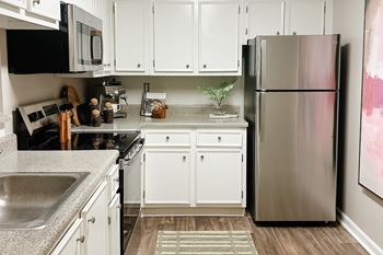 Glen park apartments large kitchen with european-style cabinetry